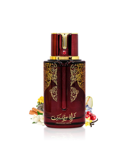 arabiyat cranberry musk perfume bottle surrounded with fragrance notes like cranberry and lotus  shows against white background