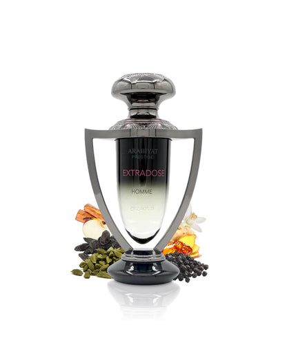 arabiyat prestige extradose homme perfume bottle surrounded by fragrance notes like cardamom and pepper shows against white background