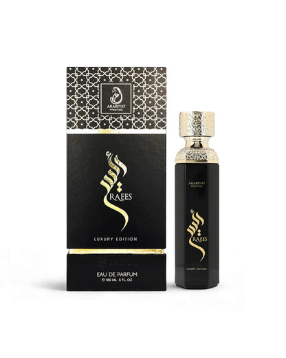 arabiyat prestige raees luxury edition black bottle shows beside its packaging against white background