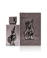 arabiyat prestige revolt uncaged perfume bottle shows beside its packaging against white background