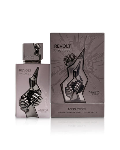 arabiyat prestige revolt uncaged perfume bottle shows beside its packaging against white background