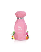 arabiyat prestige safa perfume bottle surrounded by fragrance notes like vanilla and litchi shows against white background