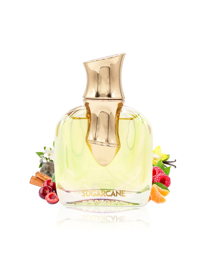 arabiyat prestige sugarcane vanilla perfume bottle surrounded by fragrance notes like fruits shows against white background