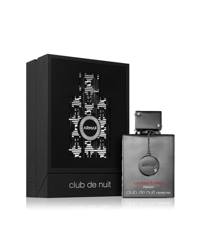 Armaf Club de Nuit Limited Edition parfum bottle next to its black presentation box, featuring a silver and black design with white and red text.