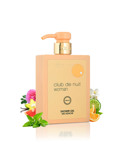 armaf club de nuit woman shower gel bottle surrounded with orange and vanilla  shows against white background