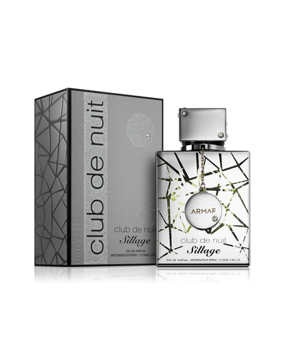 armaf club de nuit sillage perfume bottle shows beside its packaging against white background
