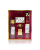 Asdaaf ameerat al arab gift set in a red and gold box, containing a perfume spray, a perfume air freshener, and a perfume spray bottle.
