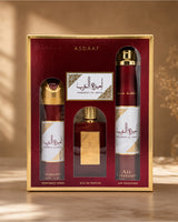 Asdaaf ameerat al arab gift set in a red and gold box photograph over marble surface