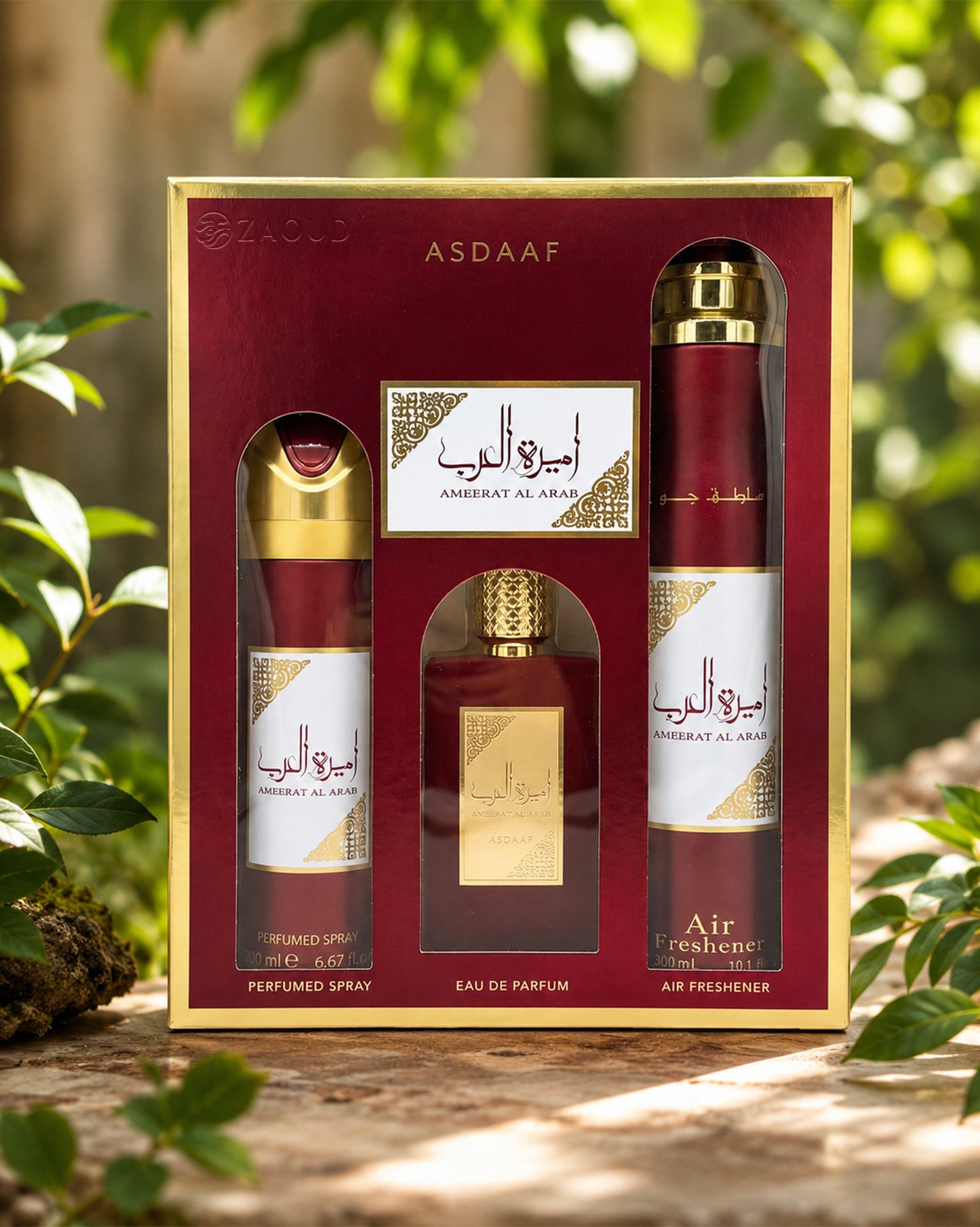 Asdaaf ameerat al arab gift set in a red and gold box, containing a perfume spray, a perfume air freshener, and a perfume spray bottle photograph in nature