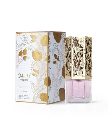 asdaaf raneen perfume bottle beside packaging shows against white background
