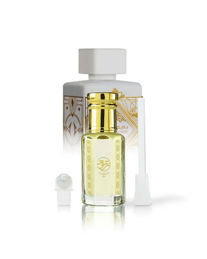 badr wafi perfume oil bottle shows with lattafa perfume bottle behind against white background