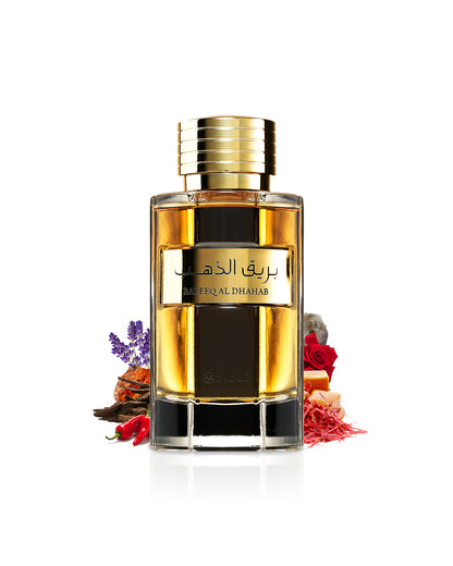 al wataniah bareeq al dahab perfume bottle surrounded with fragrance notes like saffron and rose shows against white background