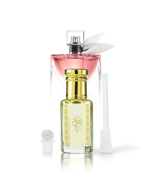 belle aura erfume oil bottle beside roller and stick with La Vie Est Belle bottle behind shows against white background