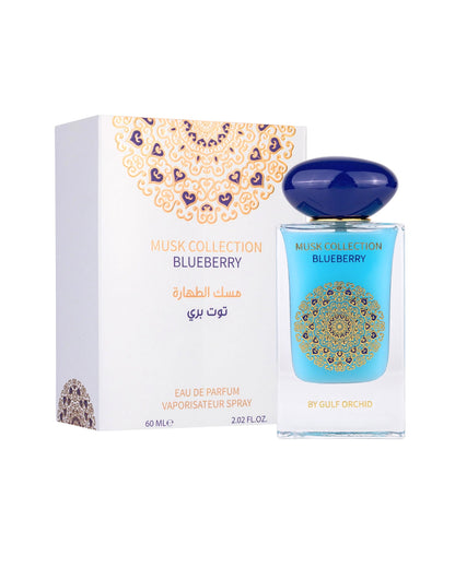 blueberry musk by gulf orchid perfume bottle beside its box shows against white background