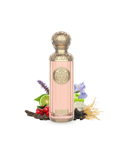 calabria eau de parfum by gissah perfumes bottle surrounded with ingredients like citrus and ous with many others shows from behind the bottle against white background