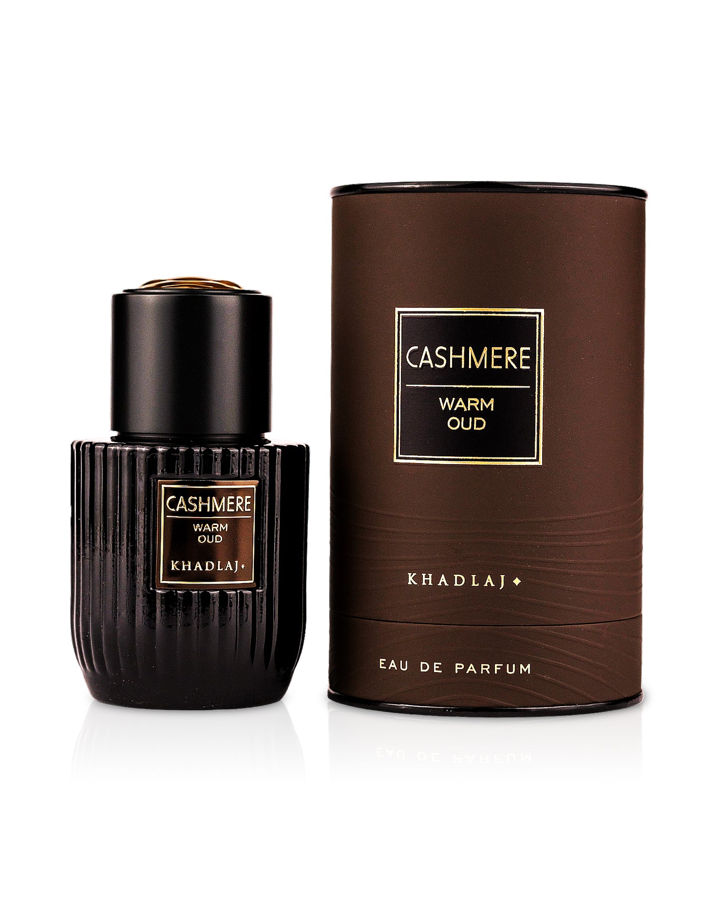 khadlaj cashmere warm oud perfume bottle shows beside its box against white background