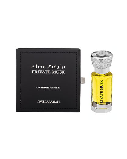 private musk by swiss arabian perfume oil bottle shows beside its box against white background