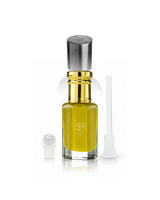 damask perfume oil bottle beside roller and stick shows against white background