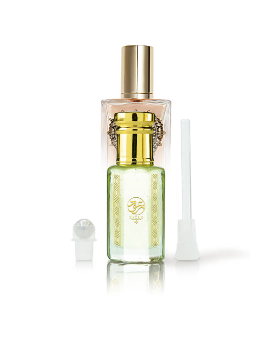 duvina perfume oil bottle shows beside roller and stick with devotion perfume bottle bottle behind against white background