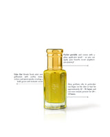 eden hut perfume oil bottle filled with yellow-amber oil, topped with a shiny gold cap, shown on a white background with descriptive text callouts.