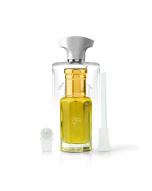 eden hut perfume oil bottle with original perfume bottle behind against white background