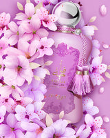 fatima velvet love extrait de parfum perfume bottle photograph between violet flowers