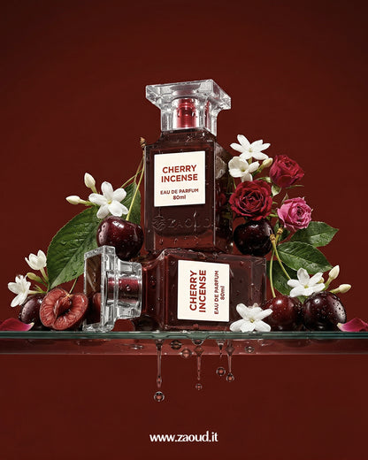 Cherry Incense perfume bottle by Fragrance World with cherries, flowers, and water droplets on a red background, showcasing a smoky sweet fragrance aesthetic.