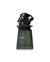 french avenue thunder Black sculpture on a green base with 'THUNDER' branding on a white background