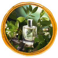 green perfume bottle surrounded by green leaves.