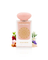 Perfume bottle labeled 'Cotton Candy' by Gulf Orchid with decorative elements like rose and caramel on a white background