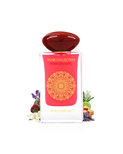 gulf orchid pomegranate perfume bottle surrounded with fragrance notes like jasmine and caramel shows behind the bottle against white background