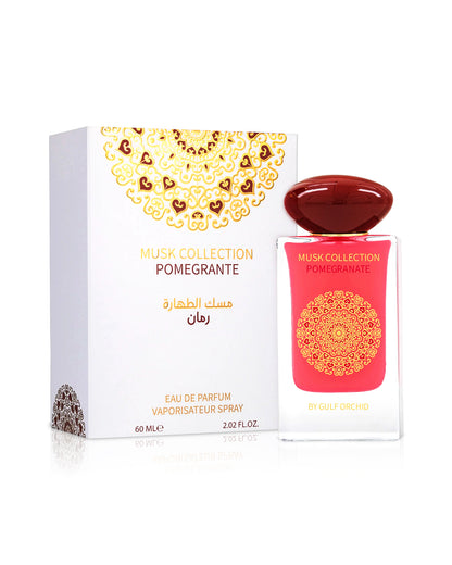 gulf orchid pomegranate perfume bottle shows beside its box against white background