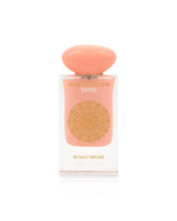gulf orchid toffee Perfume bottle with pink cap and body on a white background