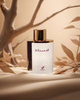 inara white eau de parfum perfume bottle photograph against warm oriental scenery