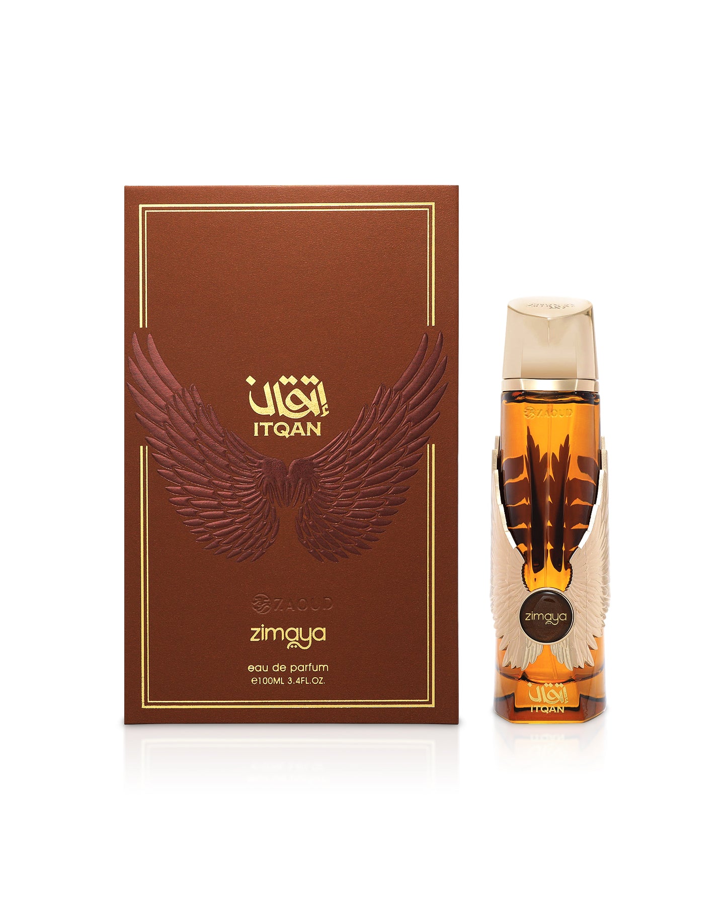 zimaya itqan gold perfume bottle shows beside its box against white background