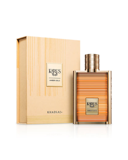 karus amber gold by khadlaj perfume bottle shows beside its box against white background