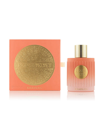 khadlaj peach velvet perfume bottle shows beside its packaging against white background