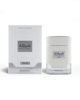 khadlaj shiyaaka snow perfume bottle shows beside its packaging against white background