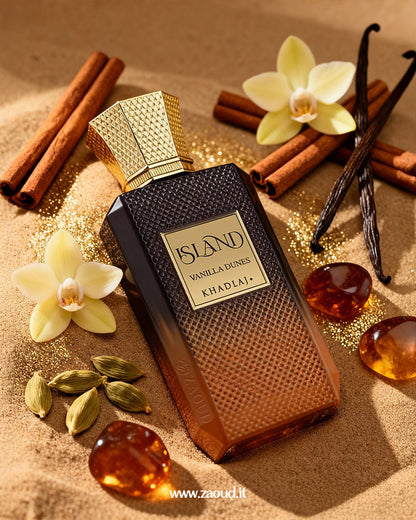 Khadlaj Island Vanilla Dunes perfume is placed on sand, surrounded by vanilla, amber stones, cardamoms, and cinnamon.