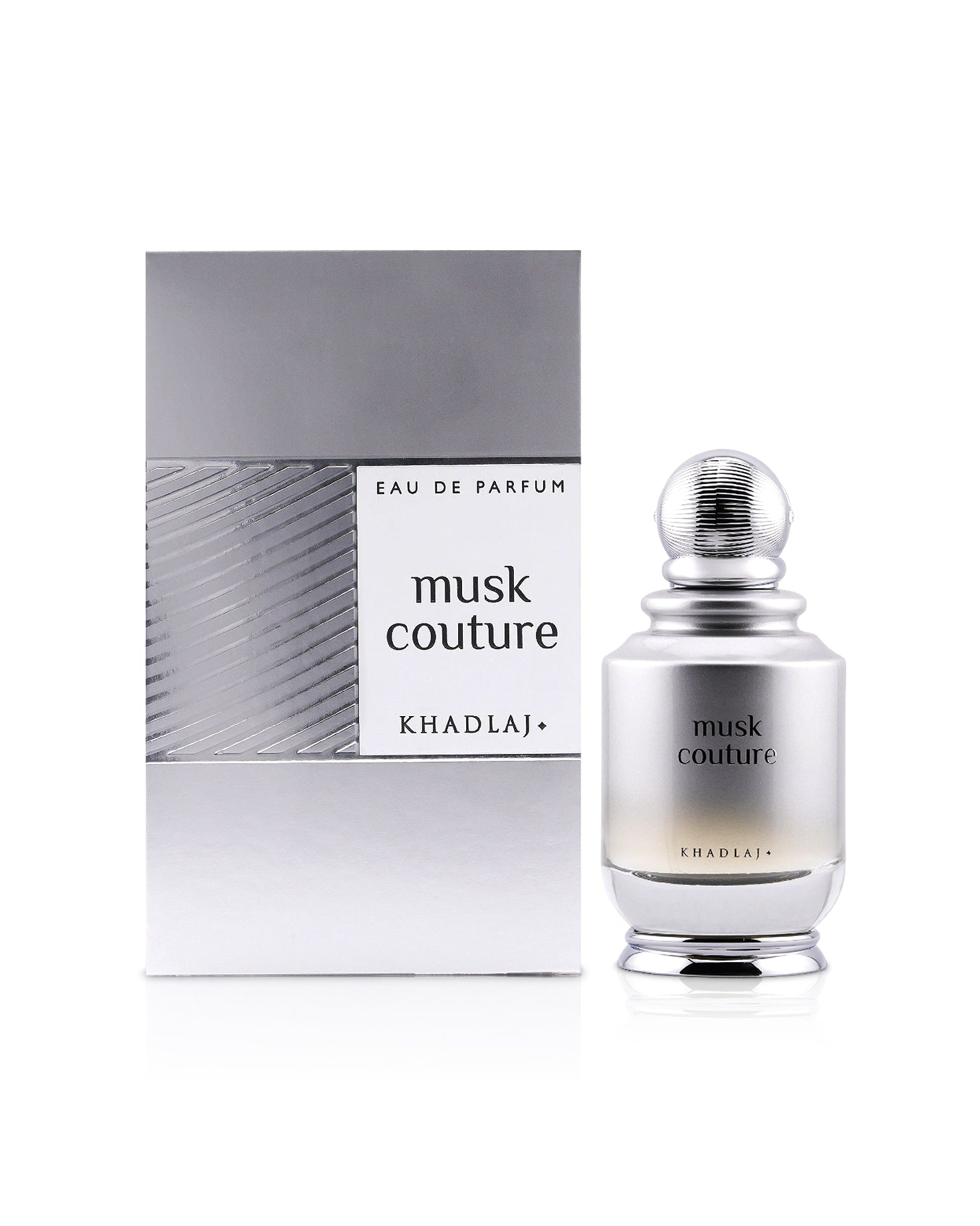 khadlaj musk couture perfume bottle shows beside its box against white background 