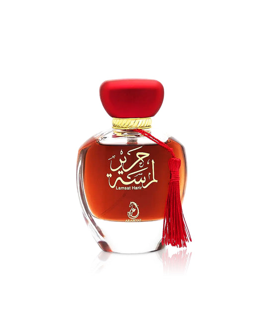 my perfumes lamsat harir Perfume bottle with red cap and tassel on a white background 