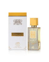 lattafa ana abiyedh passion perfume bottle shows beside its packaging against white background