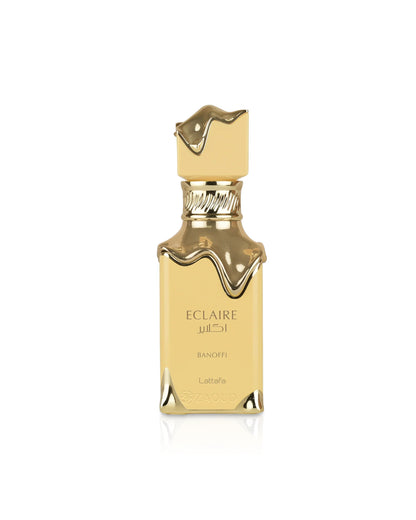 lattafa eclaire banoffi Gold perfume bottle with 'Eclaire' branding on a white background