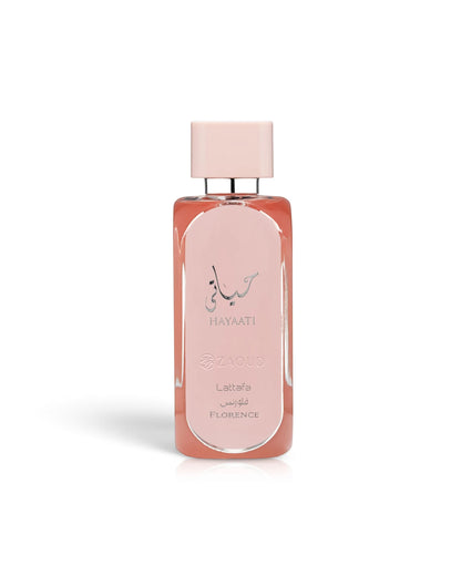A rectangular glass perfume bottle with a pale pink cap and a peachy-pink liquid inside, featuring the HAYAATI florence by lattafa, set against a plain white background.