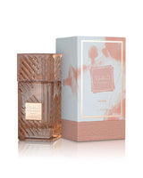 lattafa khamrah mira perfume bottle shows beside its packaging against white background
