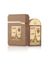lattafa love in paris perfume bottle shows beside packaging against white background 