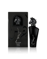 lattafa maahir black edition perfume bottle shows beside its packaging against white background