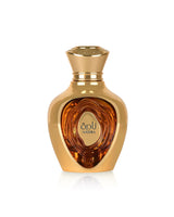 lattafa nadira Gold perfume bottle with a red interior on a white background