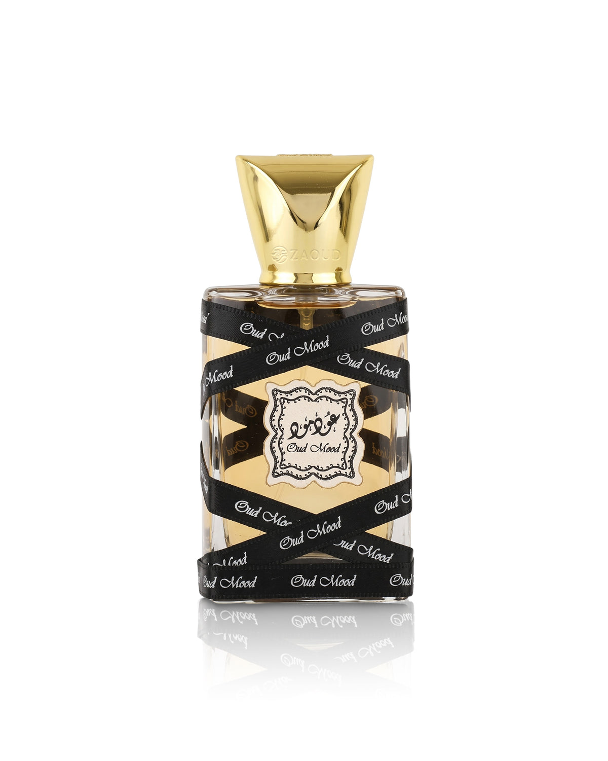lattafa oud mood miniature perfume with a faceted gold cap and a black-and-gold patterned label, shown on a white background with a reflection below.