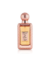 lattafa queen of roses perfume bottle shows against white background